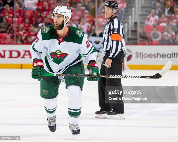 Kyle Quincey of the Minnesota Wild follows the play against the Detroit Red Wings during the first ever NHL game at the new Little Caesars Arena on...