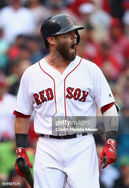 Dustin Pedroia of the Boston Red Sox reacts after being called out on strikes in the second inning against the Houston Astros during game four of the...