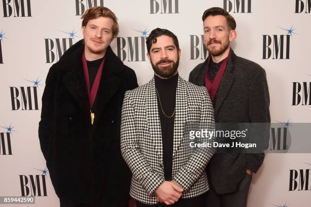 Jack Bevan, Yannis Philippakis and Edwin Congreave of Foals attend the BMI London Awards at The Dorchester on October 9, 2017 in London, England.
