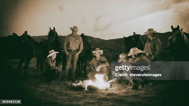 cowboys campfire - retro cowgirl stock pictures, royalty-free photos & images