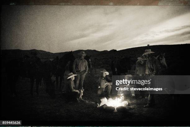 cowboys campfire - retro cowgirl stock pictures, royalty-free photos & images