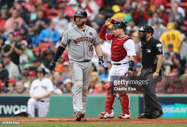 Brian McCann of the Houston Astros reacts after striking out in the fourth inning against the Boston Red Sox during game four of the American League...