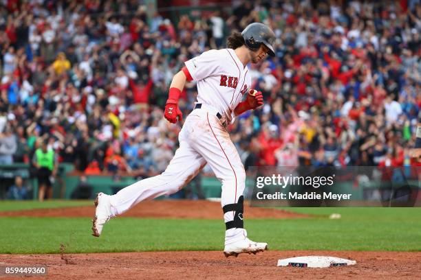 Andrew Benintendi of the Boston Red Sox runs the bases after hitting a two-run home run in the fifth inning against the Houston Astros during game...