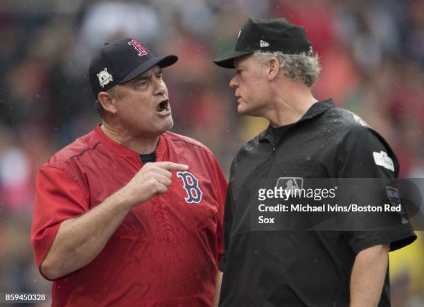 Manager John Farrell of the Boston Red Sox argues with first base umpire Mike Everitt after being ejected from the game against the Houston Astros in...