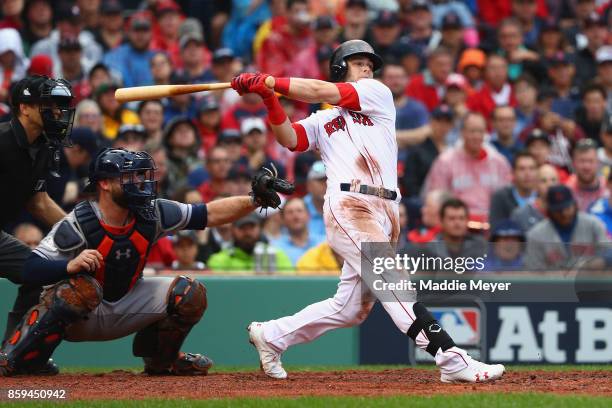 Andrew Benintendi of the Boston Red Sox hits a two-run home run in the fifth inning against the Houston Astros during game four of the American...