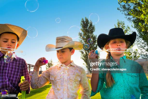 Little Children Blowing Bubbles