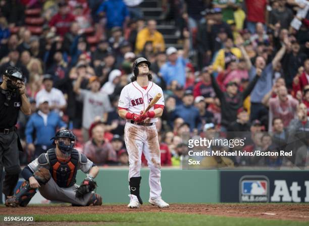 Andrew Benintendi of the Boston Red Sox hits a two-run home run against the Houston Astros in the fifth inning of game four of the American League...