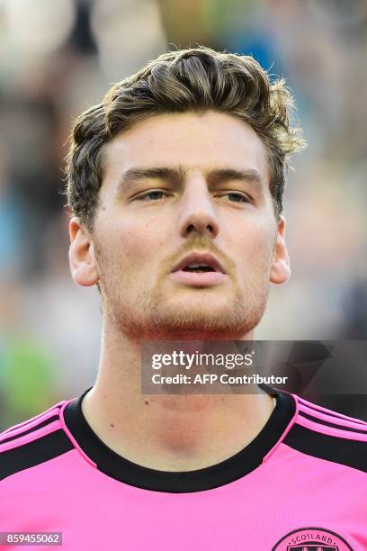 Scotland's forward Chris Martin looks on prior to the FIFA World Cup 2018 qualification football match between Slovenia and Scotland at Stadium...