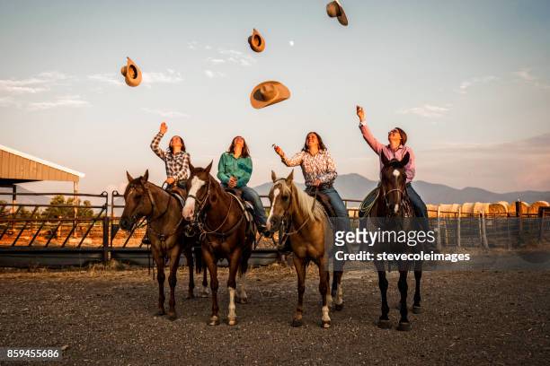tossing cowbou hat - cowgirl stock pictures, royalty-free photos & images