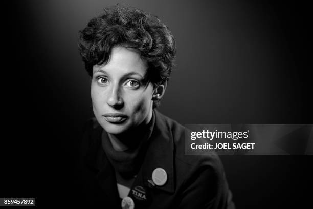 French novelist Alice Zeniter poses during a photo session in Paris on September 28, 2017. / BLACK AND WHITE VERSION