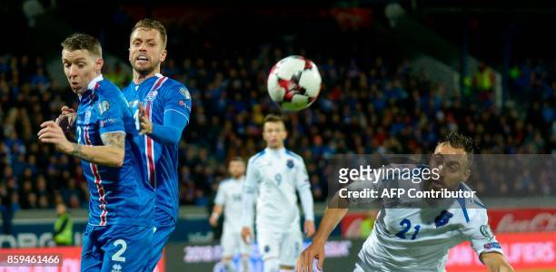 Iceland's defender Birkir Saevarsson and Kosovo's Atdhe Nuhiu vie for the ball during the FIFA World Cup 2018 qualification football match between...