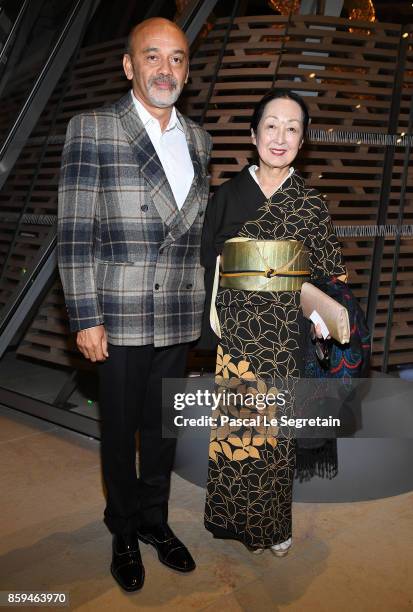 Christian Louboutin and Setsuko Klossowska de Rola attend "Etre Moderne : Le MoMA A Paris" Exhibition at Fondation Louis Vuitton on October 9, 2017...