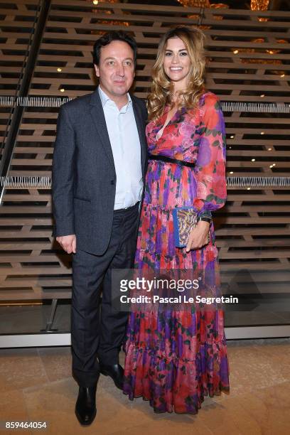 Emmanuel Perrotin and wife Lorena Vergani attend "Etre Moderne : Le MoMA A Paris" Exhibition at Fondation Louis Vuitton on October 9, 2017 in Paris,...