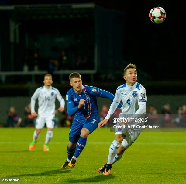 Iceland's forward Johann Berg Gudmundsson and Kosovo'S Bersant Celina vie for the ball during the FIFA World Cup 2018 qualification football match...