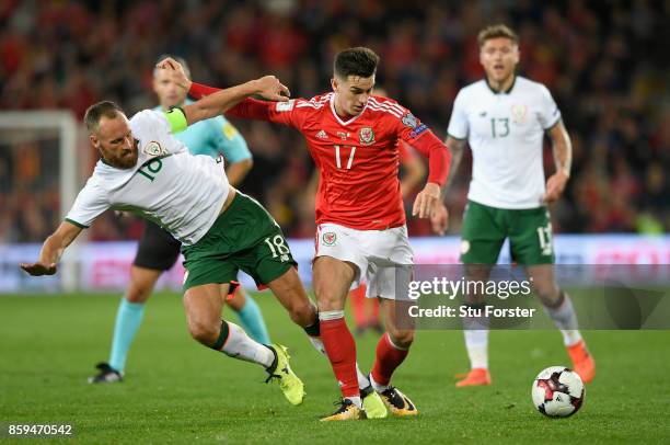 Tom Lawrence of Wales holds off David Meyler of the Republic of Ireland during the FIFA 2018 World Cup Group D Qualifier between Wales and Republic...