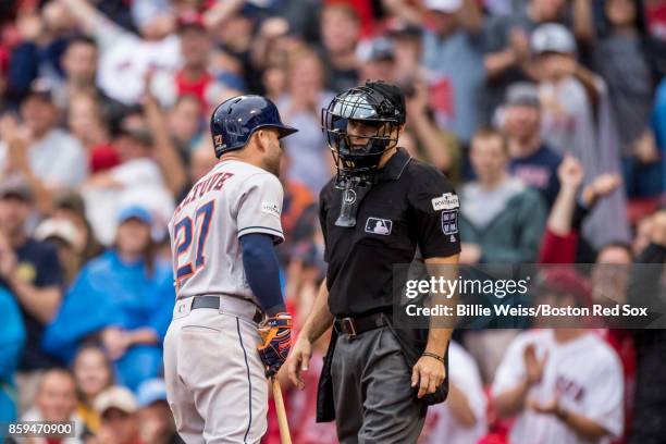 Jose Altuve of the Houston Astros argues with home plate umpire Mark Wegner during the seventh inning of game four of the American League Division...