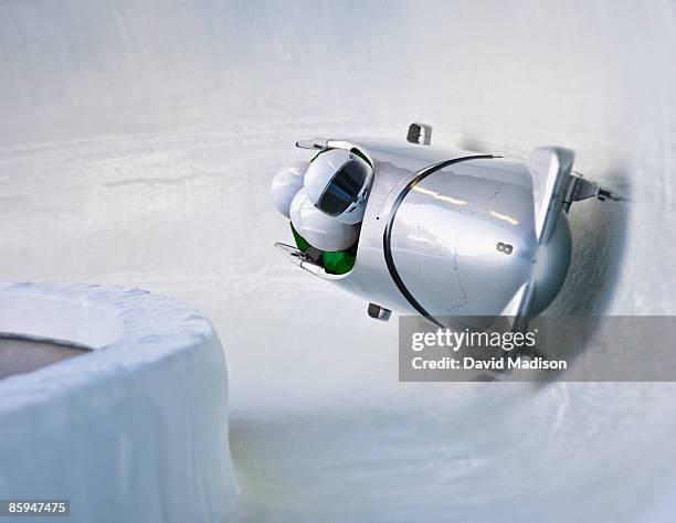 bobsled on track. - bobsleigh stock pictures, royalty-free photos & images