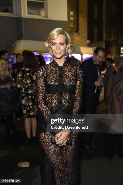 Poppy Delevingne attends the Conde Nast Traveller 20th anniversary after party at Annabel's on October 9, 2017 in London, England.