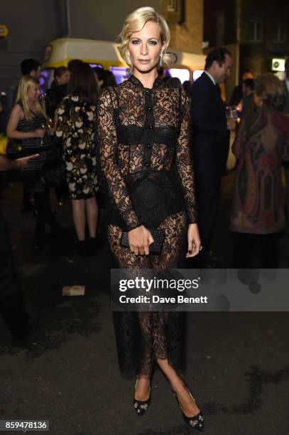 Poppy Delevingne attends the Conde Nast Traveller 20th anniversary party at Vogue House on October 9, 2017 in London, England.