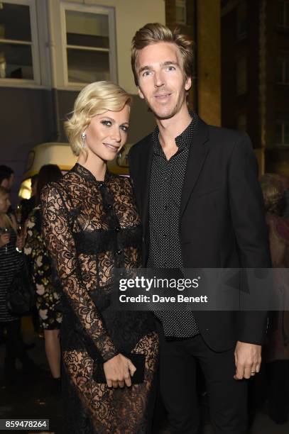 Poppy Delevingne and James Cook attend the Conde Nast Traveller 20th anniversary party at Vogue House on October 9, 2017 in London, England.