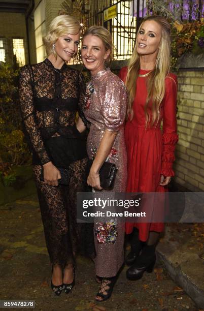 Poppy Delevingne, Melinda Stevens and Laura Bailey attend the Conde Nast Traveller 20th anniversary after party at Annabel's on October 9, 2017 in...