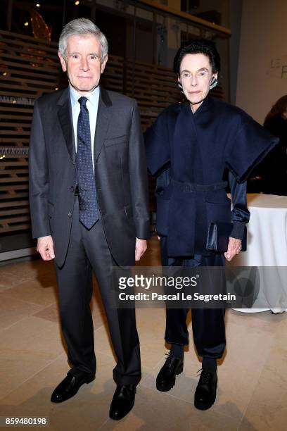 Alain Minc and wife Sophie Boisrond attend "Etre Moderne : Le MoMA A Paris" Exhibition at Fondation Louis Vuitton on October 9, 2017 in Paris, France.