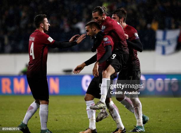 Cenk Tosun of Turkey celebrates with his teammates after scoring during the 2018 FIFA World Cup European Qualification Group I match between Finland...