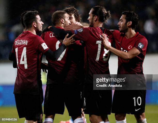 Cenk Tosun of Turkey celebrates with his teammates after scoring during the 2018 FIFA World Cup European Qualification Group I match between Finland...