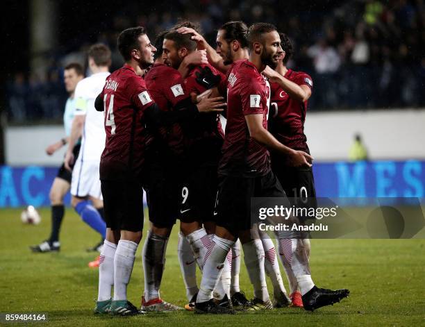 Cenk Tosun of Turkey celebrates with his teammates after scoring during the 2018 FIFA World Cup European Qualification Group I match between Finland...