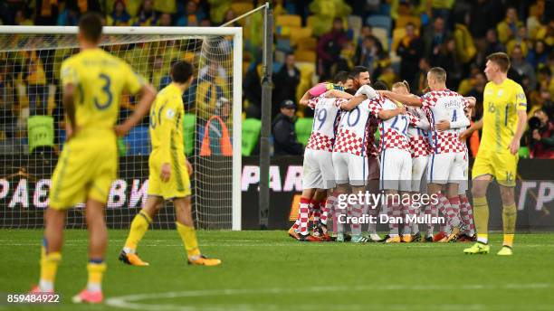 Croatia players celebrate victory after the FIFA 2018 World Cup Group I Qualifier between Ukraine and Croatia at Kiev Olympic Stadium on October 9,...