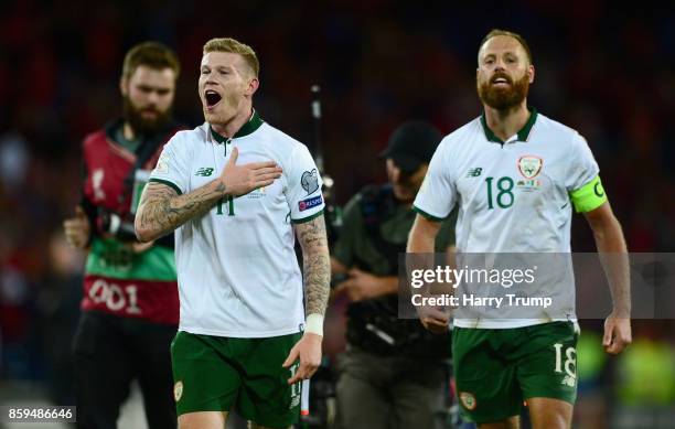 James McClean of the Republic of Ireland celebrates victory with David Meyler after the FIFA 2018 World Cup Group D Qualifier between Wales and...