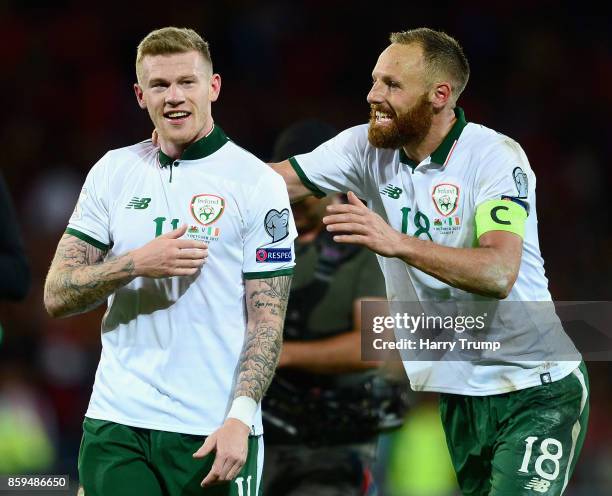 James McClean of the Republic of Ireland celebrates victory with David Meyler after the FIFA 2018 World Cup Group D Qualifier between Wales and...
