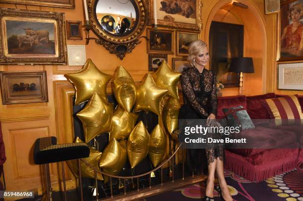 Poppy Delevingne attends the Conde Nast Traveller 20th anniversary after party at Annabel's on October 9, 2017 in London, England.