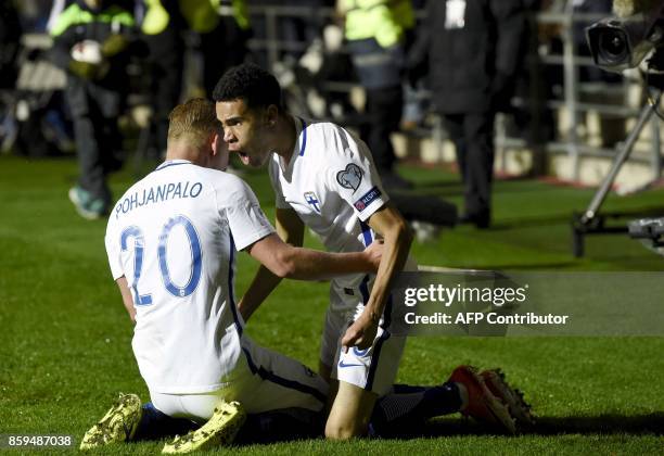 Joel Pohjanpalo and Pyry Soiri of Finland celebrate Pohjanpalo's 2-2 equalizer during the FIFA World Cup 2018 qualifying football match between...