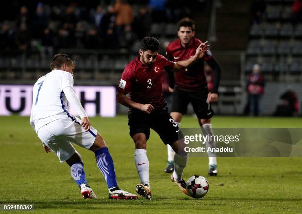 Ismail Koybasi of Turkey in action against Robin Lod of Finland during the 2018 FIFA World Cup European Qualification Group I match between Finland...