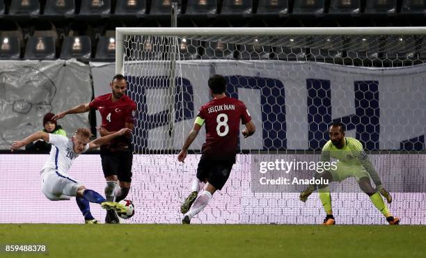 Omer Toprak and Selcuk Inan of Turkey in action against Joel Pohjanpalo of Finland during the 2018 FIFA World Cup European Qualification Group I...