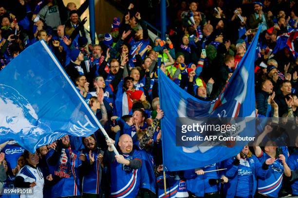Iceland's fans celebrates at the FIFA World Cup 2018 qualification football match between Iceland and Kosovo in Reykjavik, Iceland on October 9,...