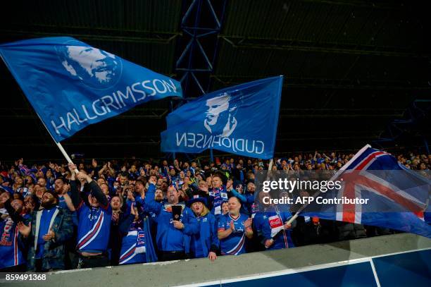 Iceland's fans celebrates at the FIFA World Cup 2018 qualification football match between Iceland and Kosovo in Reykjavik, Iceland on October 9,...