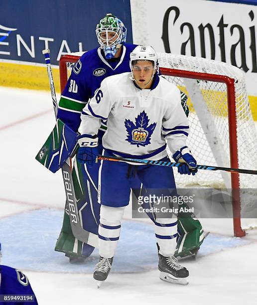 Kerby Rychel of the Toronto Marlies puts a screen on Thatcher Demko of the Utica Comets during AHL game action on October 7, 2017 at Ricoh Coliseum...