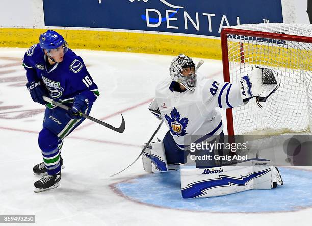 Josephy LaBate of the Utica Comets tips a shot on Kasimir Kaskisuo of the Toronto Marlies during AHL game action on October 7, 2017 at Ricoh Coliseum...
