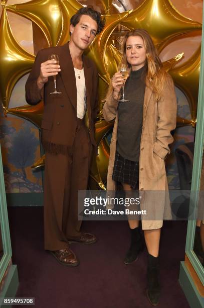 Max Cocking and guest attend the Conde Nast Traveller 20th anniversary after party at Annabel's on October 9, 2017 in London, England.