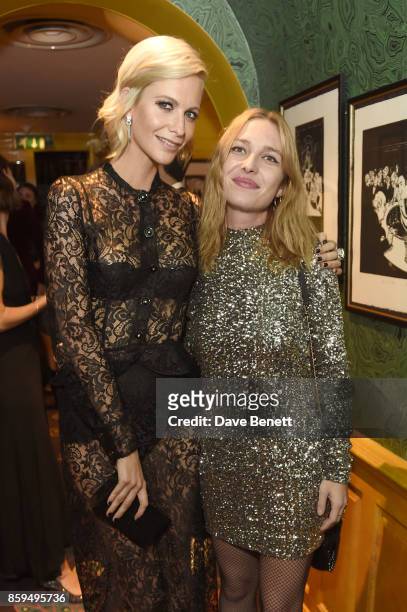 Poppy Delevingne and Josephine de la Baume attend the Conde Nast Traveller 20th anniversary after party at Annabel's on October 9, 2017 in London,...