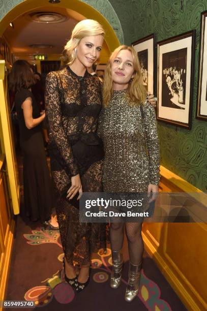 Poppy Delevingne and Josephine de la Baume attend the Conde Nast Traveller 20th anniversary after party at Annabel's on October 9, 2017 in London,...