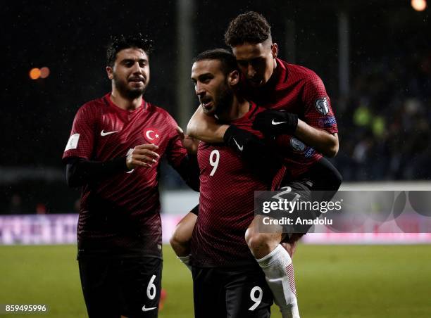 Cenk Tosun of Turkey celebrates with his teammates Emre Mor and Ozan Tufan after scoring during the 2018 FIFA World Cup European Qualification Group...