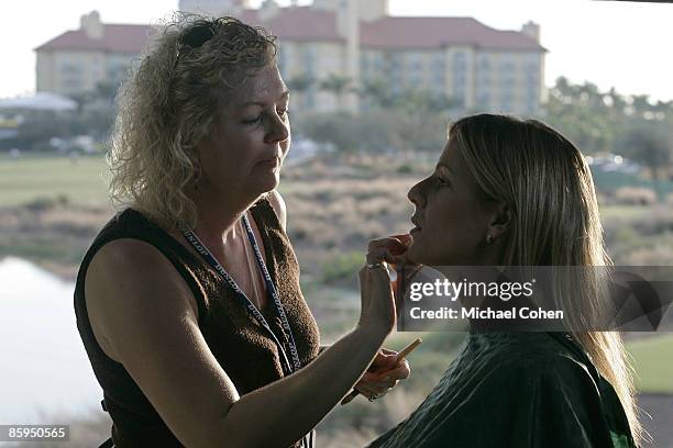 Kelly Tilghman, of the Golf Channel, gets makeup before broadcasting during the first round of the Merrill Lynch Shootout at the Tiburon Golf Club in...