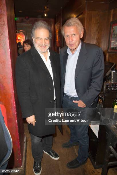 Raphael Mezrahi and Patrick Poivre D'Arvor attend "Carnets d'un Sale Gosse" Laurent Gerra Signing his book at Buddha Bar on October 9, 2017 in Paris,...