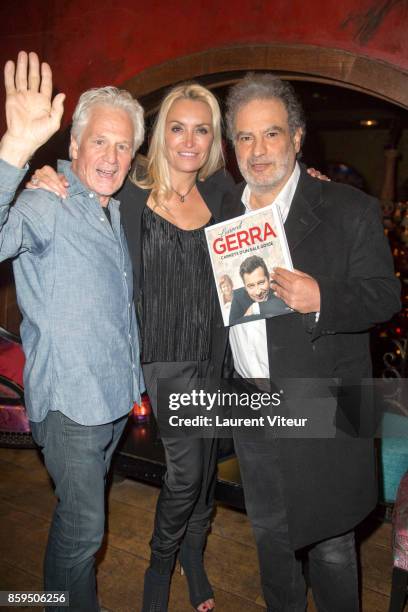 Gerard Lenormand, Chrystelle Bardet and Raphael Mezrahi attend "Carnets d'un Sale Gosse" Laurent Gerra Signing his book at Buddha Bar on October 9,...