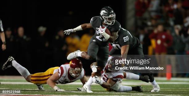 Jamal Morrow of the Washington State Cougars carries the ball against the USC Trojans in the second half at Martin Stadium on September 29, 2017 in...