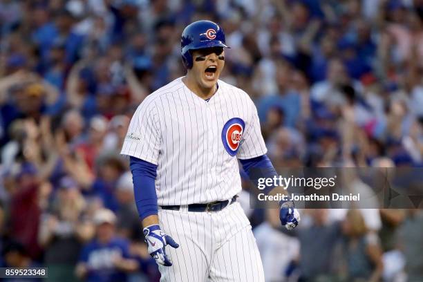 Anthony Rizzo of the Chicago Cubs reacts after hitting a single in the eighth inning against the Washington Nationals during game three of the...