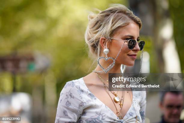 Caroline Daur is seen, outside Miu Miu, during Paris Fashion Week Womenswear Spring/Summer 2018, on October 3, 2017 in Paris, France.